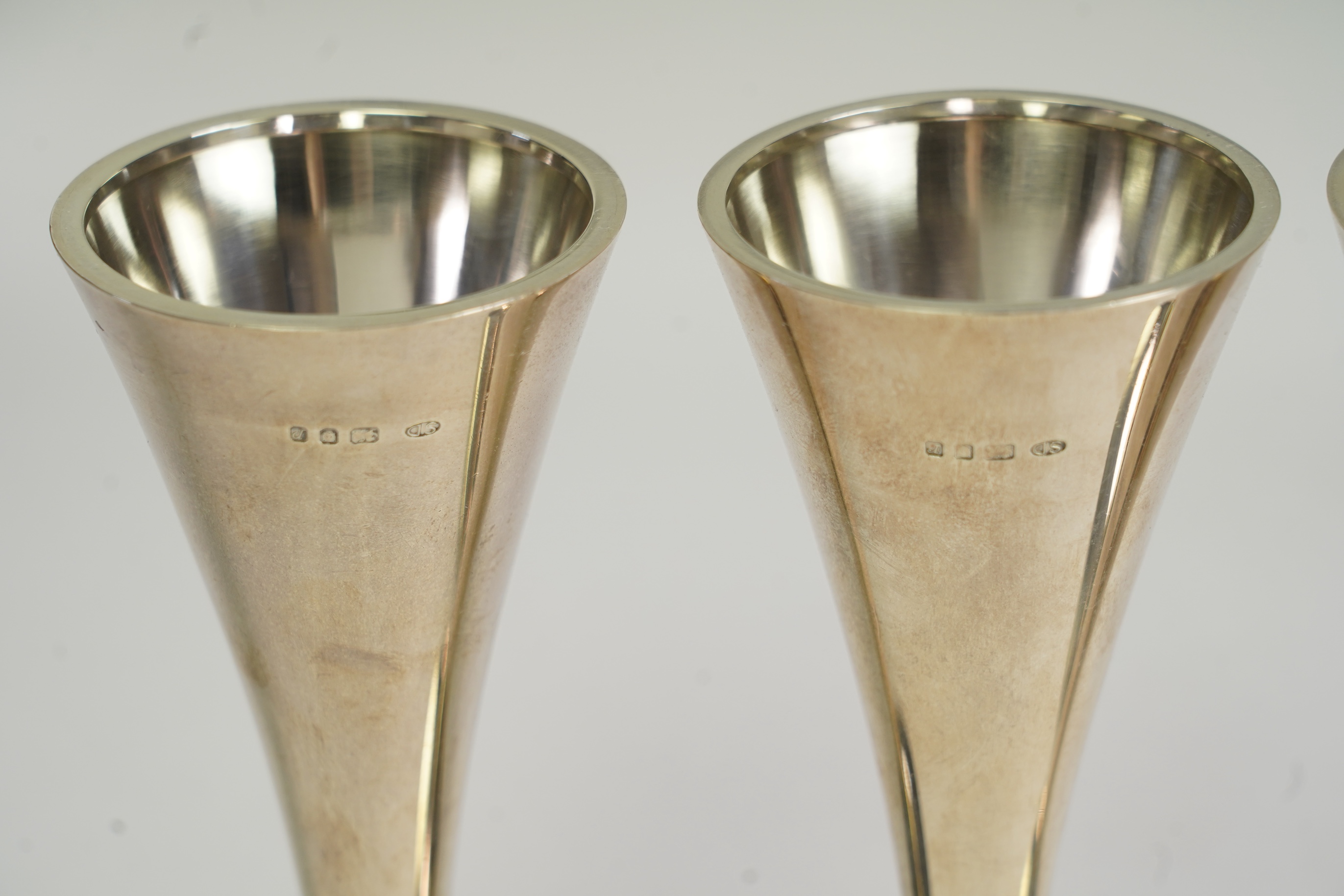 Two pairs of Elizabeth II Stuart Devlin silver candlestick bases